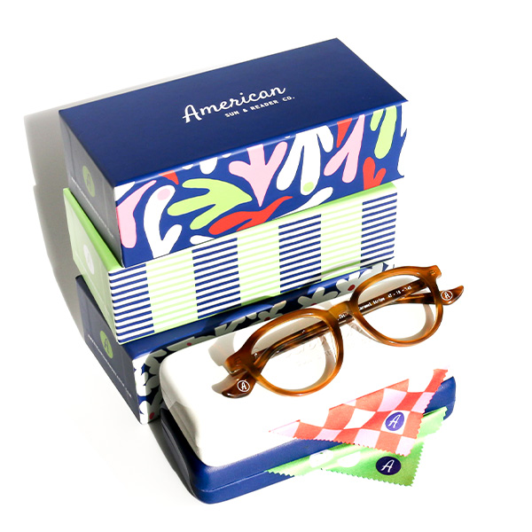 Stacked Cases of AS&R Glasses